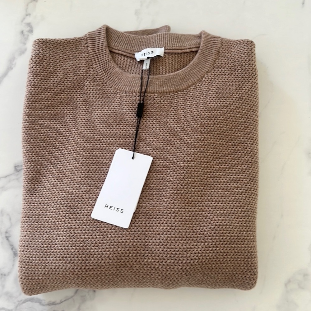 Men’s knit sweater in size Small